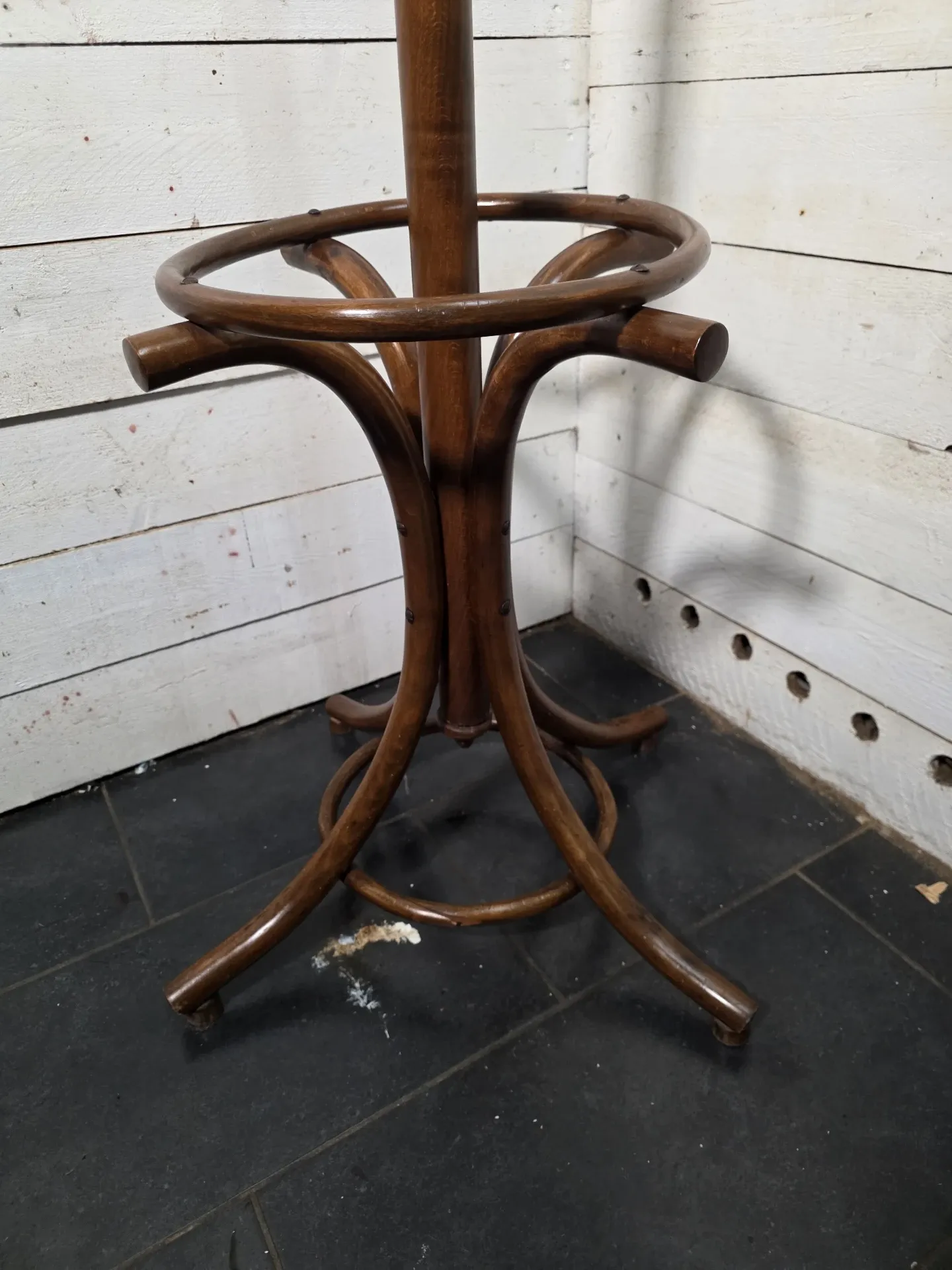 Curved antique wooden parrot