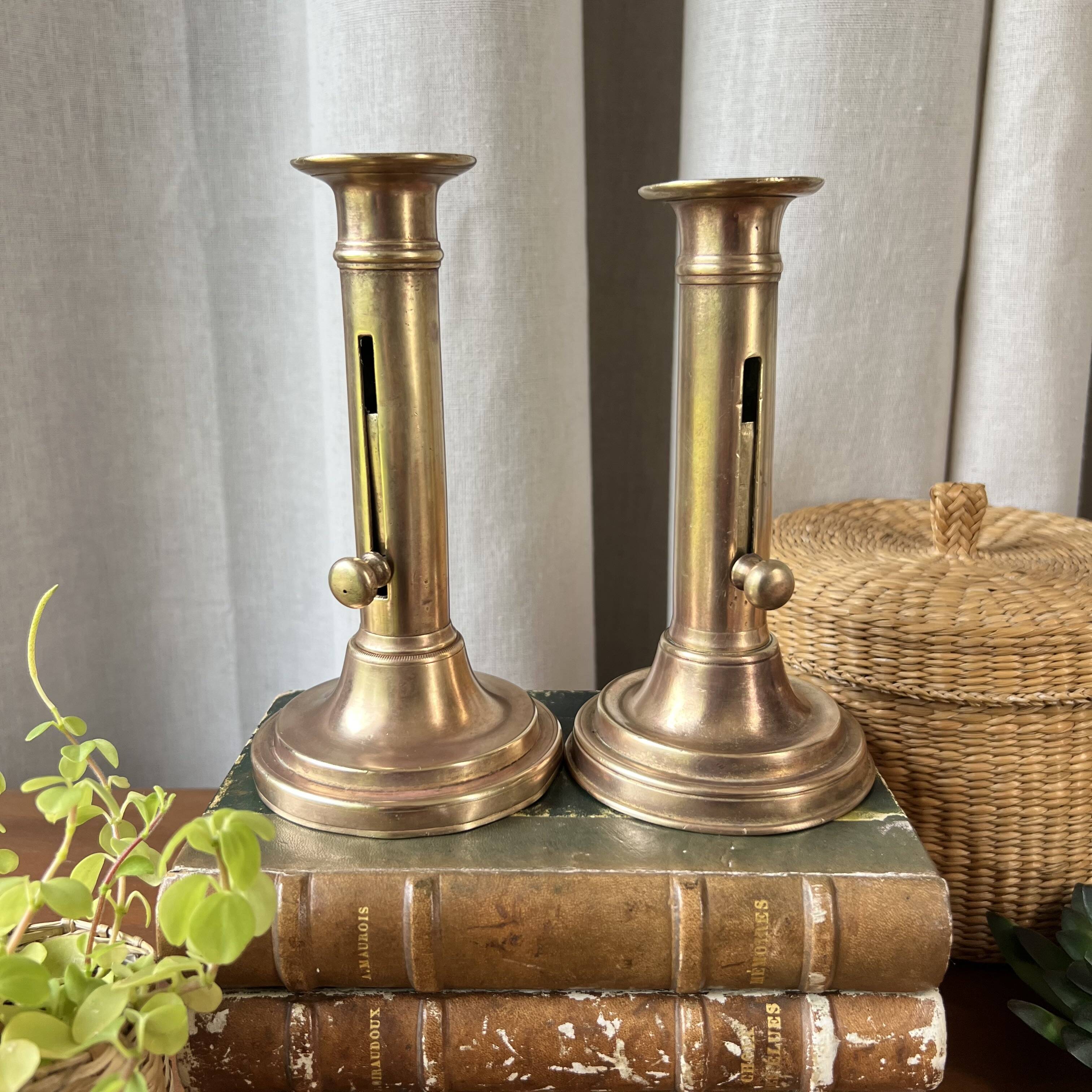 Duo of brass candlesticks