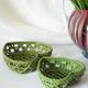 Pair of vacuum pocket ceramic braided openwork