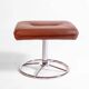 Vintage Scandinavian ottoman in brown leather with a chrome round base.