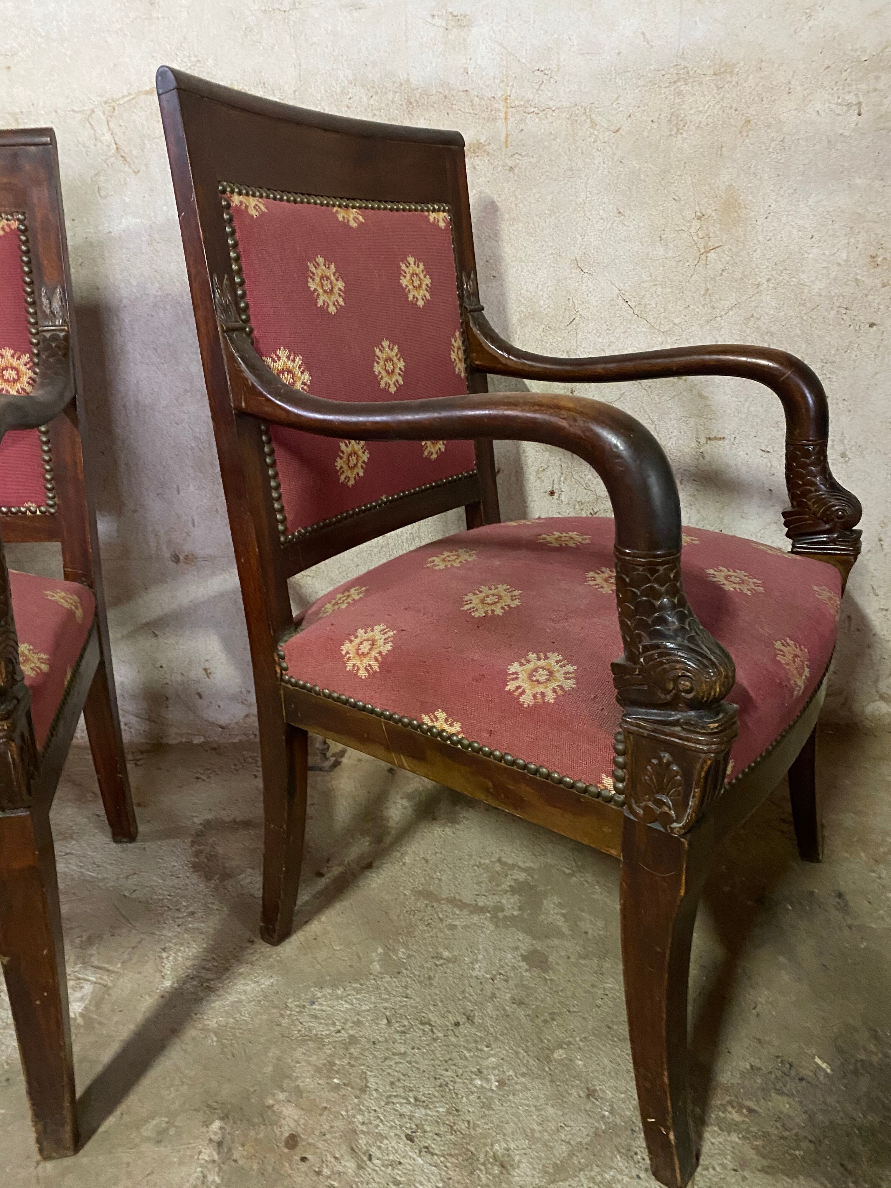 Pair of empire-style armchairs with dolphins