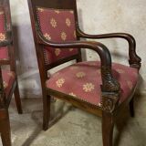 Pair of empire-style armchairs with dolphins