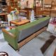Slaapbank met groene stof en teakhout