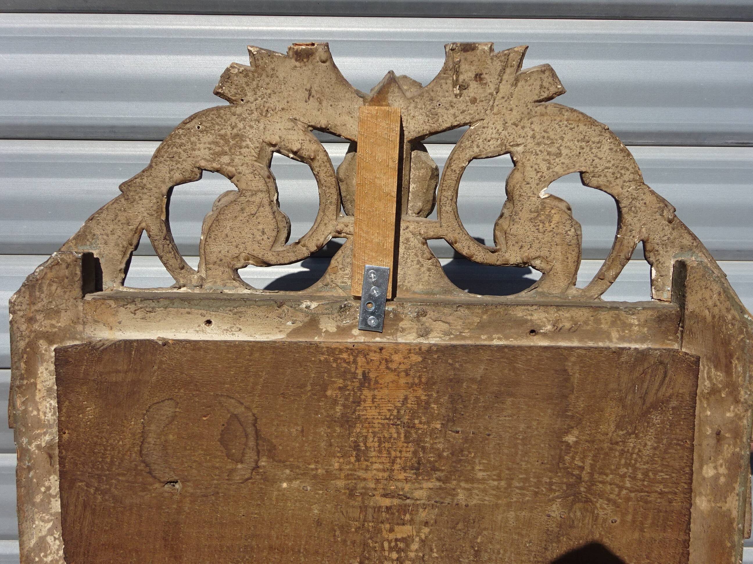 Very old Louis XVI style mirror.