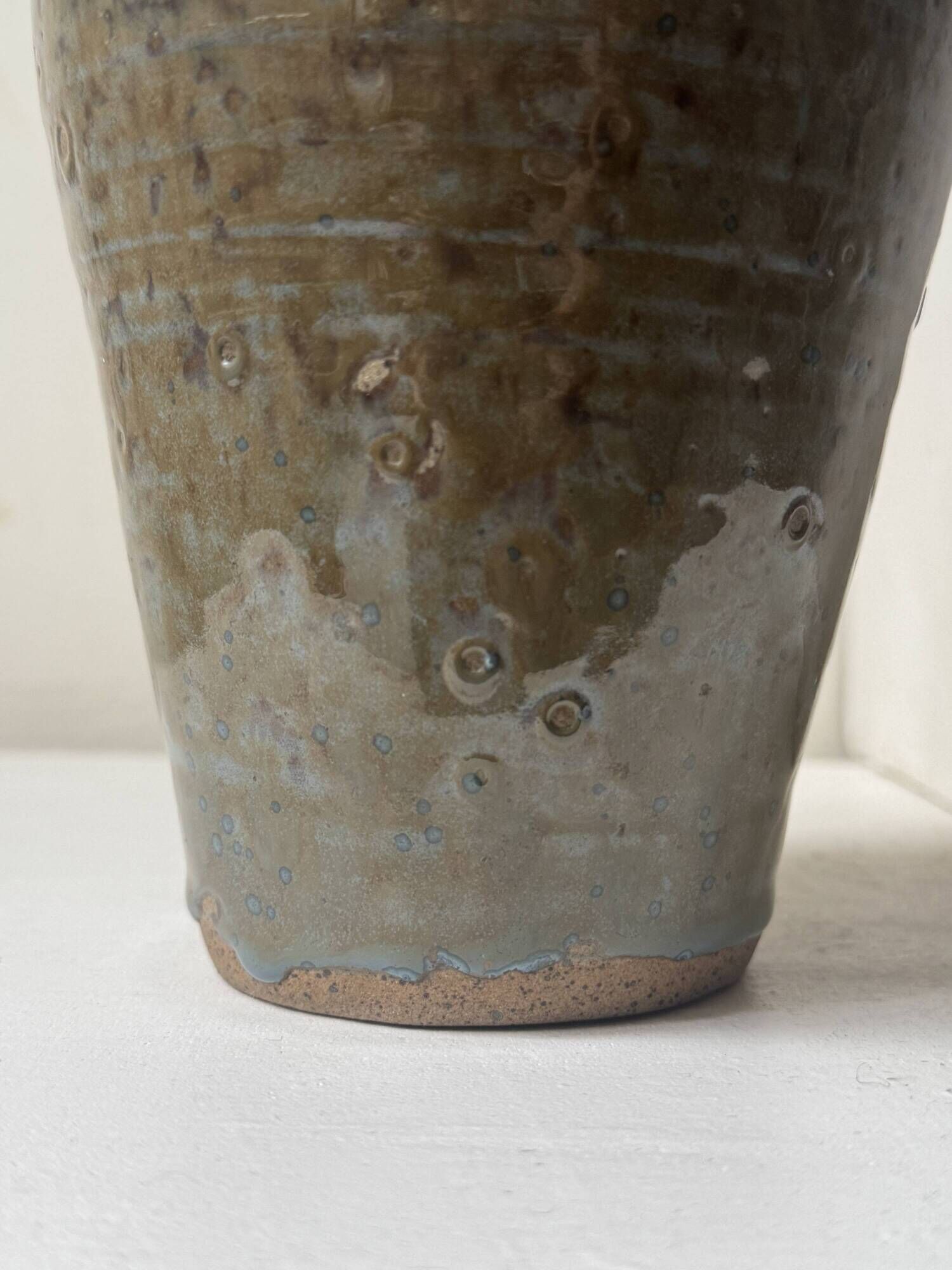 Brown-black glazed stoneware vase, signed underneath the base, circa 1950.