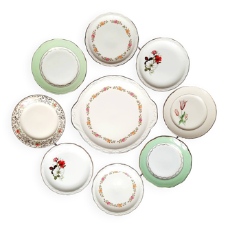 Old mismatched earthenware dessert plates with gold accompanied by a dish