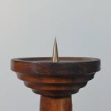 Vintage candle holder in an organic shape with a brass spike and tiered top.