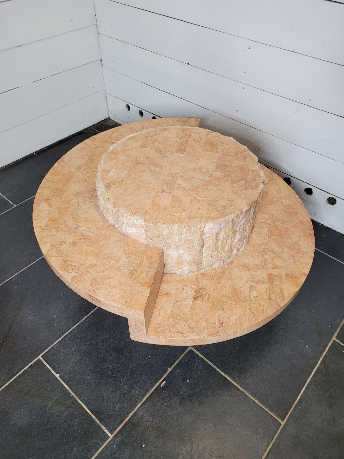 Round stone coffee table by Magnussen Ponte