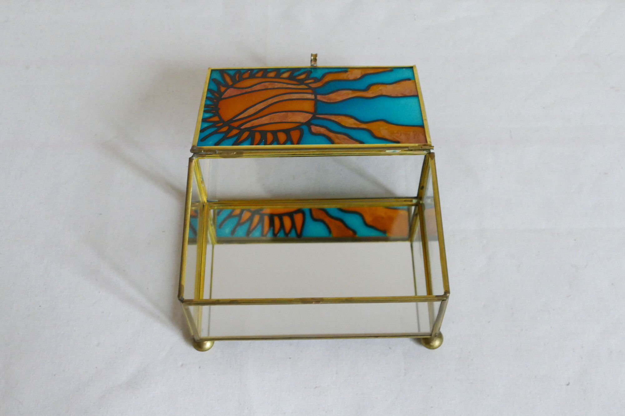 Blue and orange vintage jewellery box in 70s bohemian chic stained glass