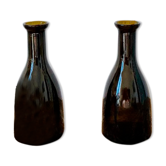 Set of 2 pretty identical amber glass bottles