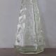 Chiseled glass bottle