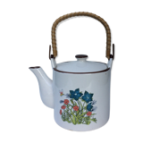 Vintage teapot with wicker handle