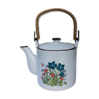 Vintage teapot with wicker handle