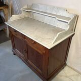 Antique wood and marble kitchen sideboard with carved backsplash