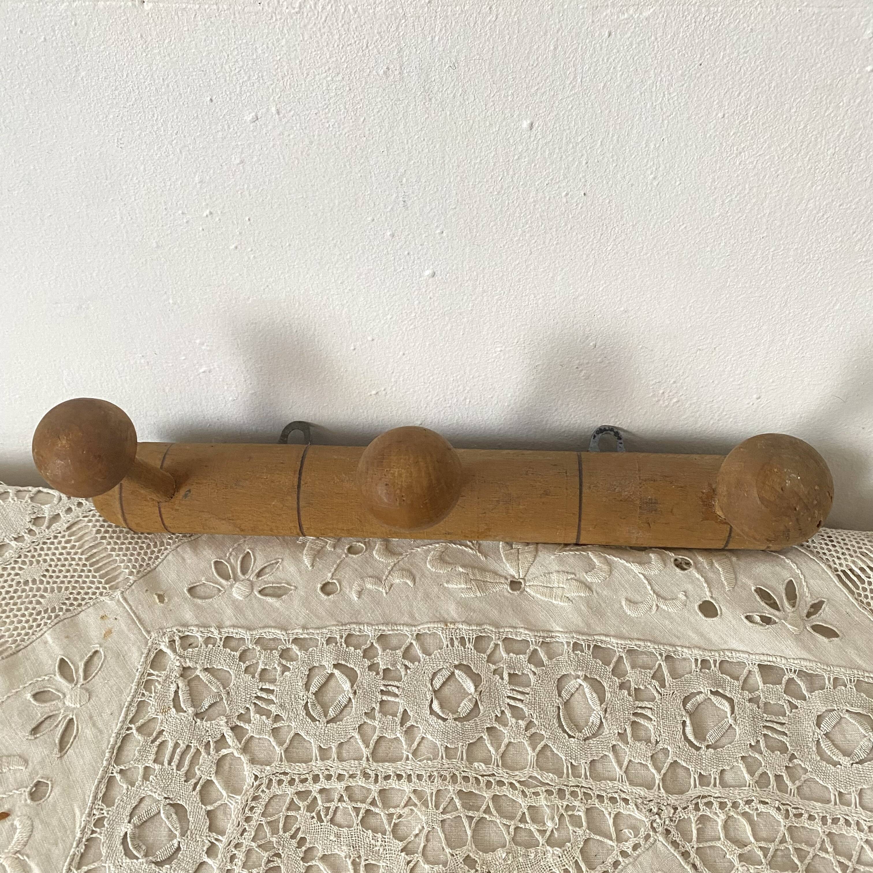 Natural wood wall coat rack