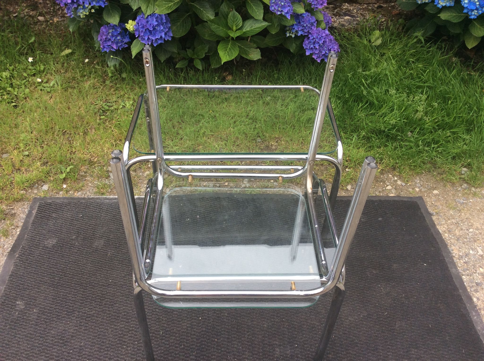 Vintage trundle tables in chrome tubular steel and glass