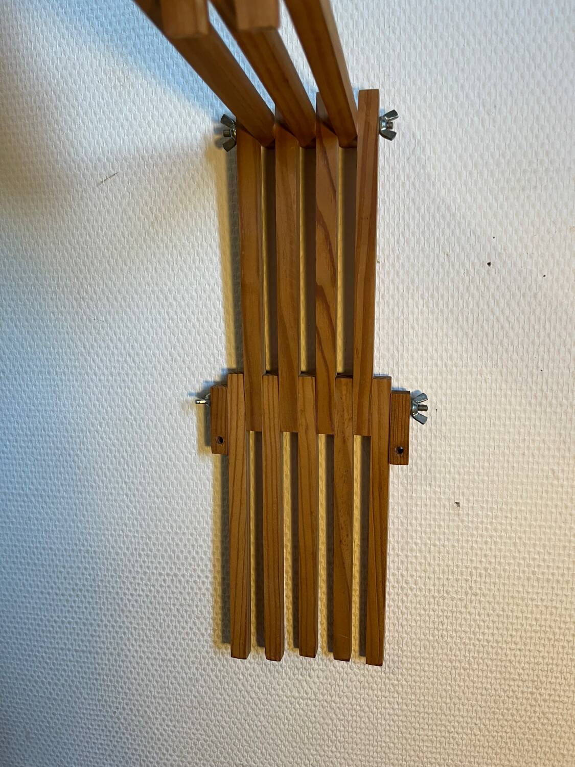 Wooden accordion wall lamp