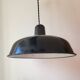Duo of white and black enameled sheet metal pendants
