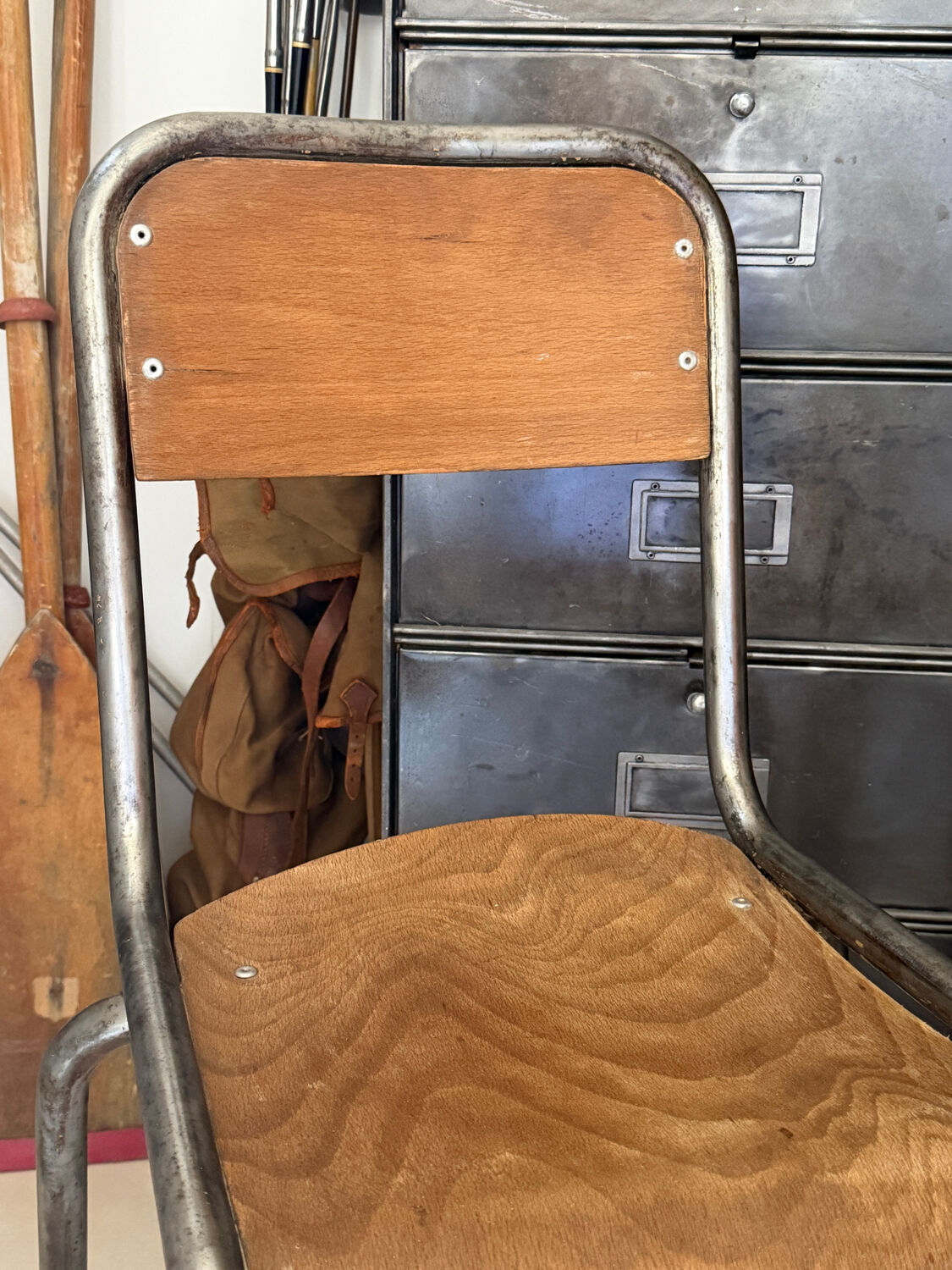 Pair of vintage adult school chairs in patinated metal