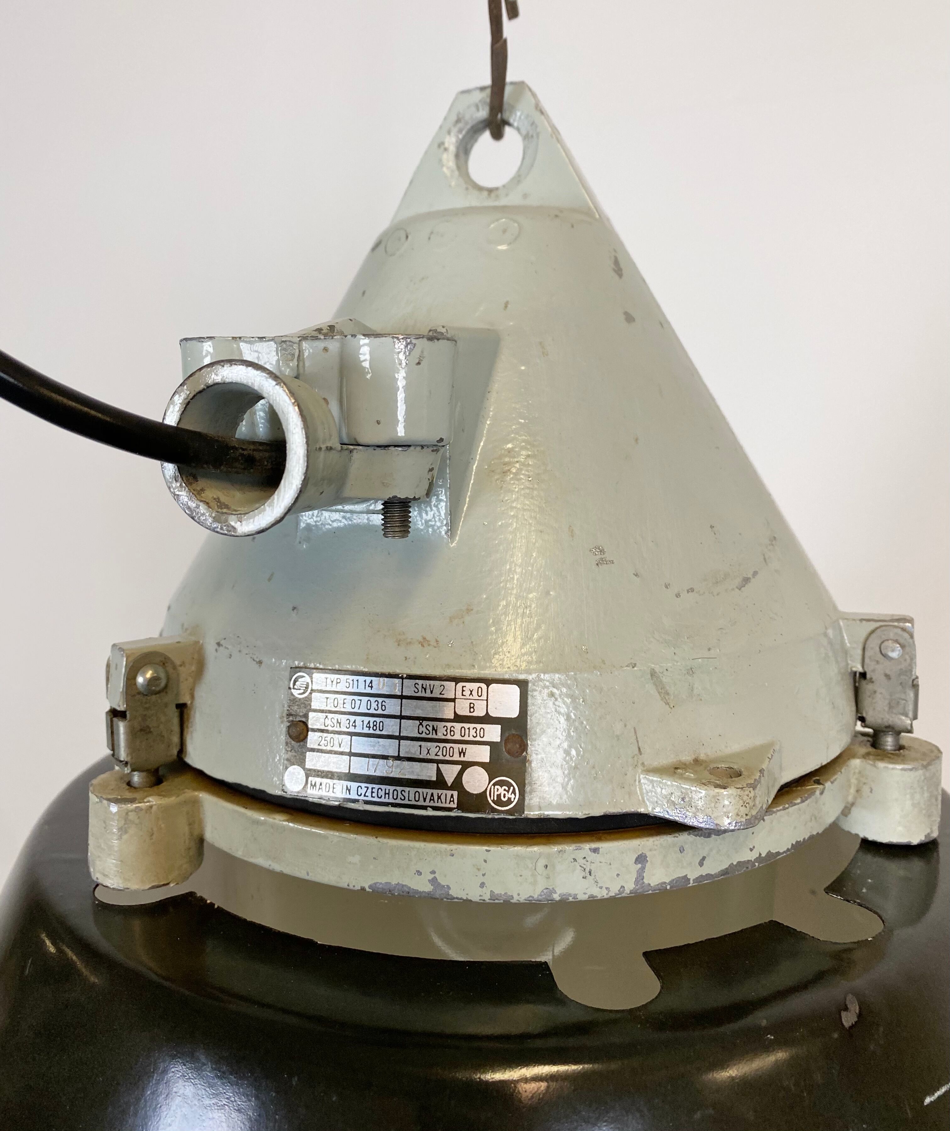 Grey cast aluminium explosion proof lamp with black enameled shade