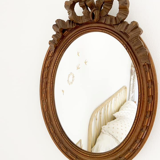 Louis XVI style oval knot mirror