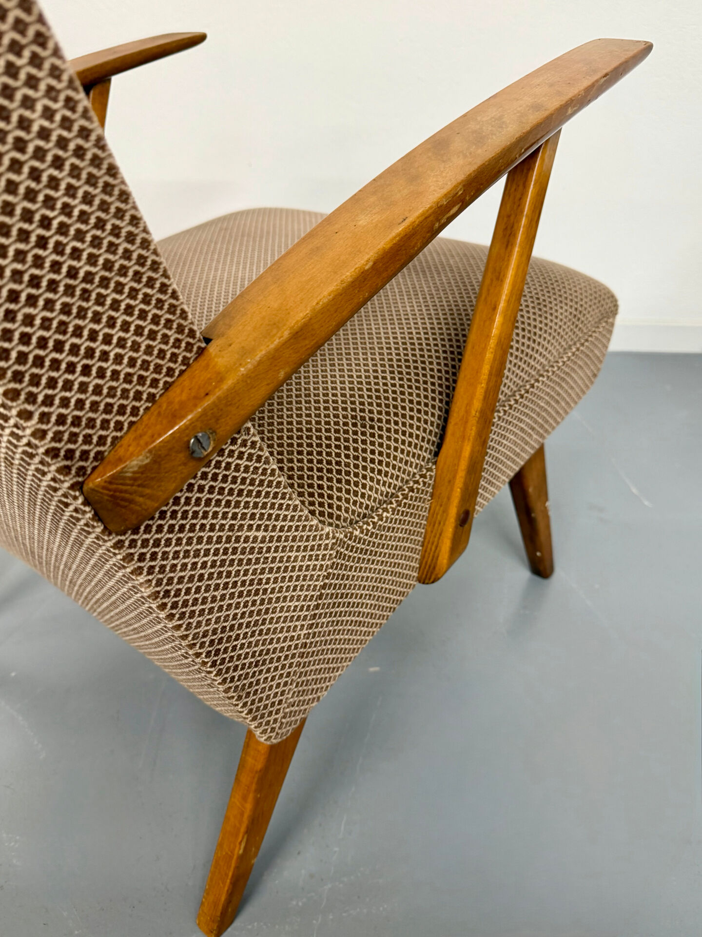 Set of 2 vintage wooden and fabric armchairs designed in the 1960s.