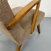 Set of 2 vintage wooden and fabric armchairs designed in the 1960s.