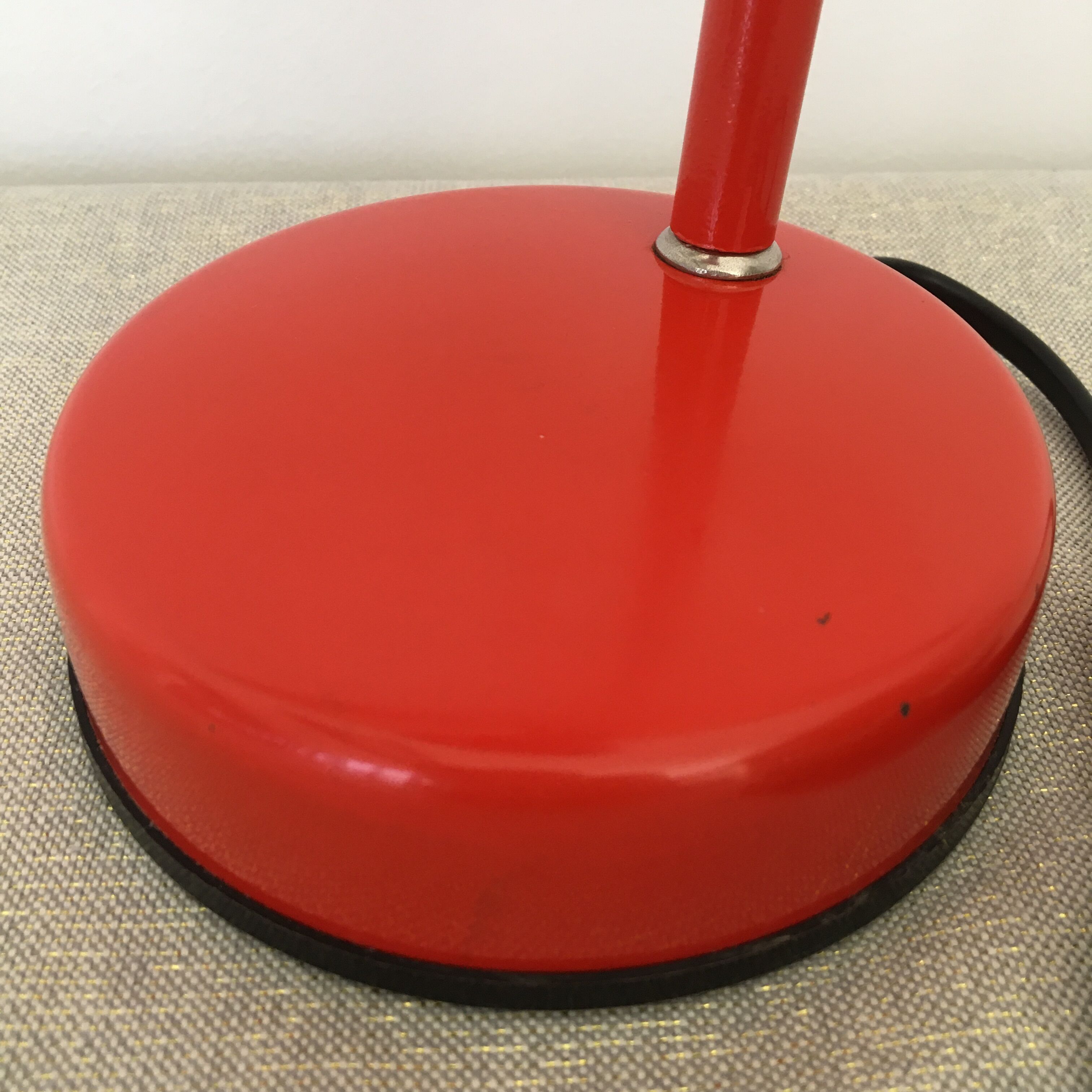 Flexible red desk lamp