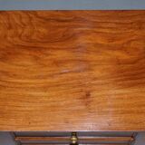 Set of hardwood dressers with finely carved bases.