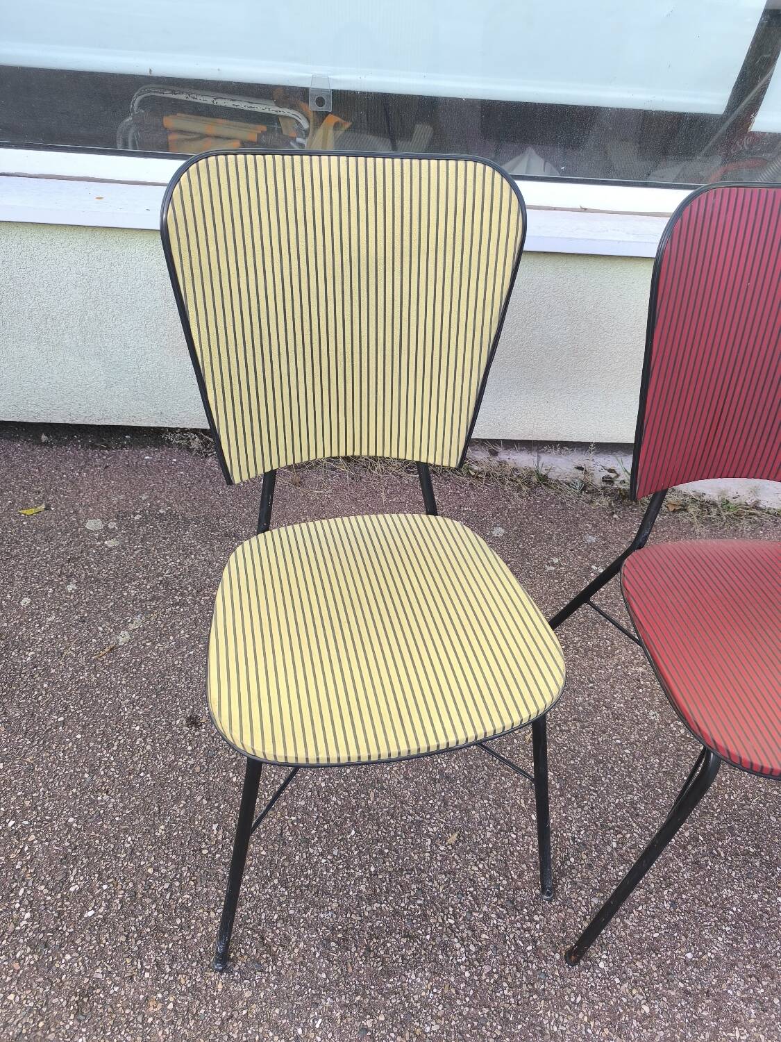 Set of 3 vintage yellow and red faux leather chairs.