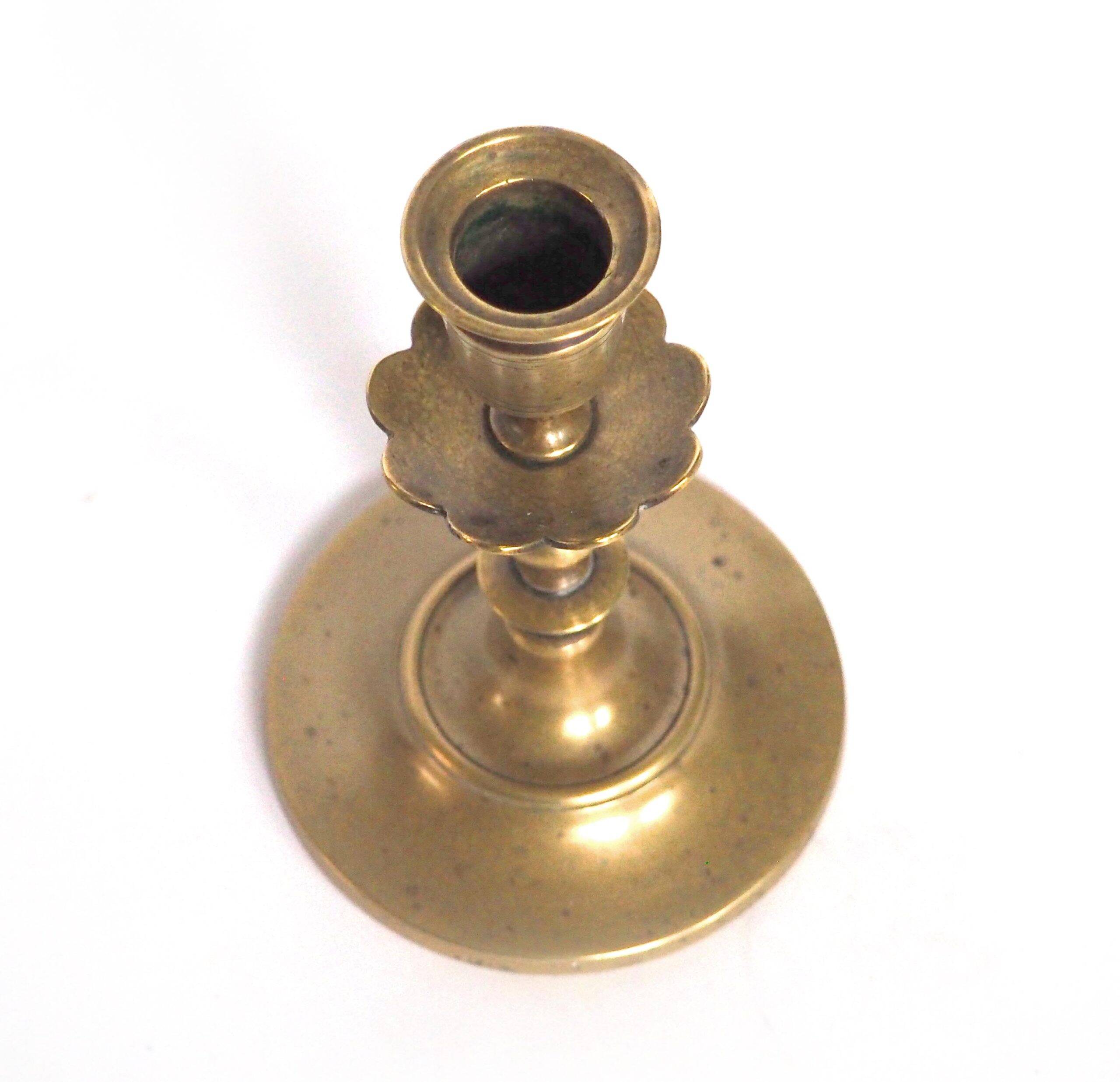 Brass candlestick with flower neck