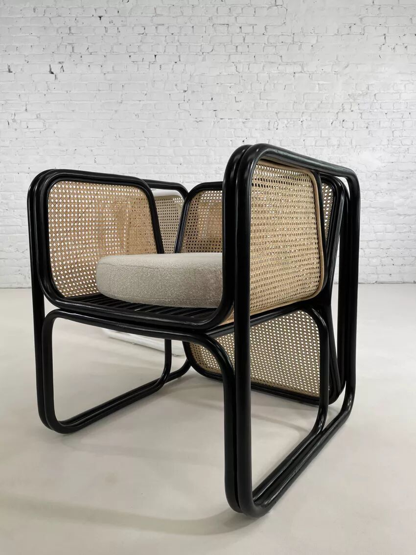 Cubic armchair in black rattan and canework