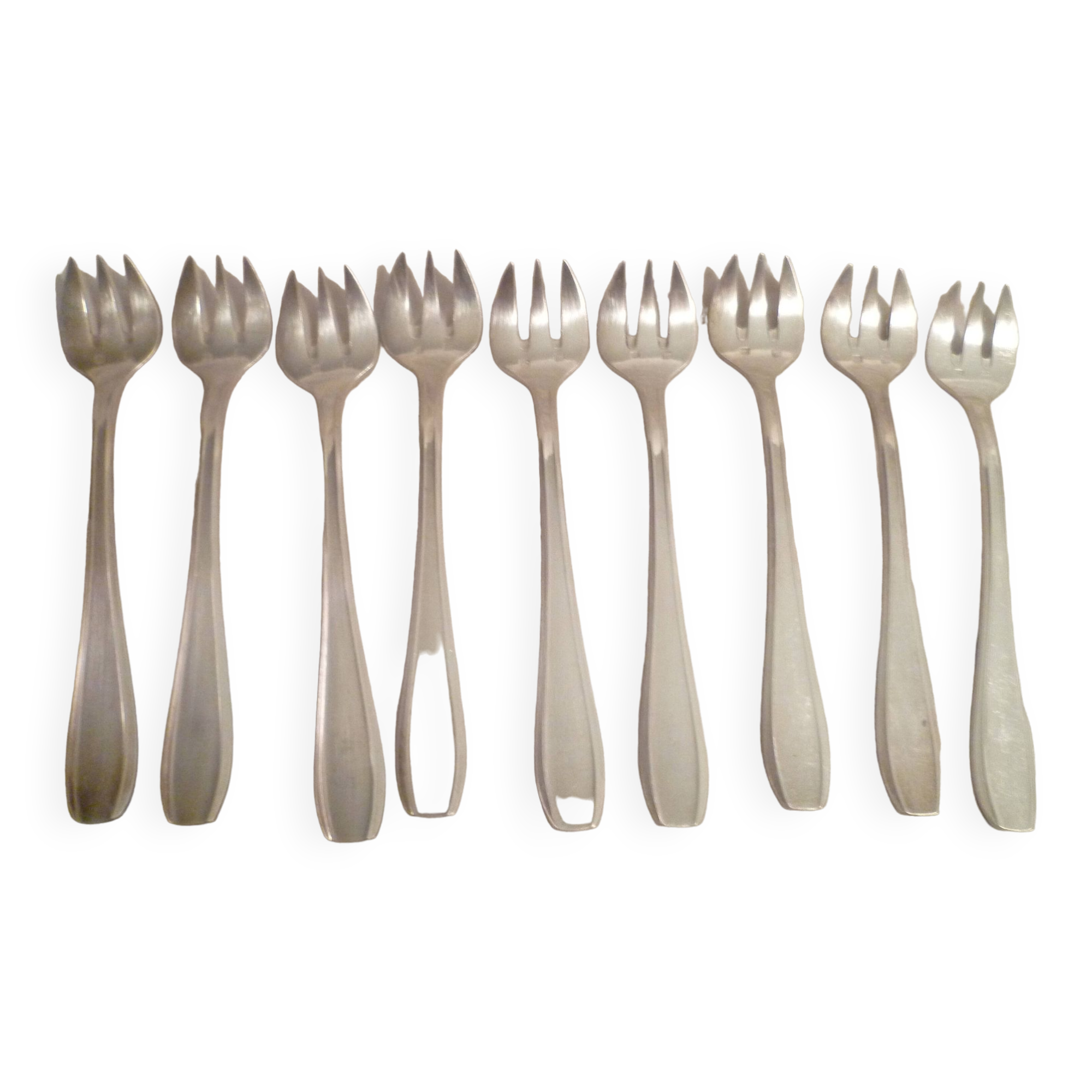 Set of 9 art deco silver oyster forks