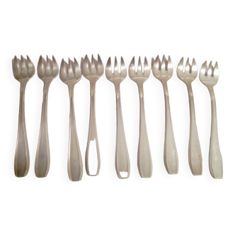 Set of 9 art deco silver oyster forks
