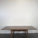 Dining table with turned oak legs.