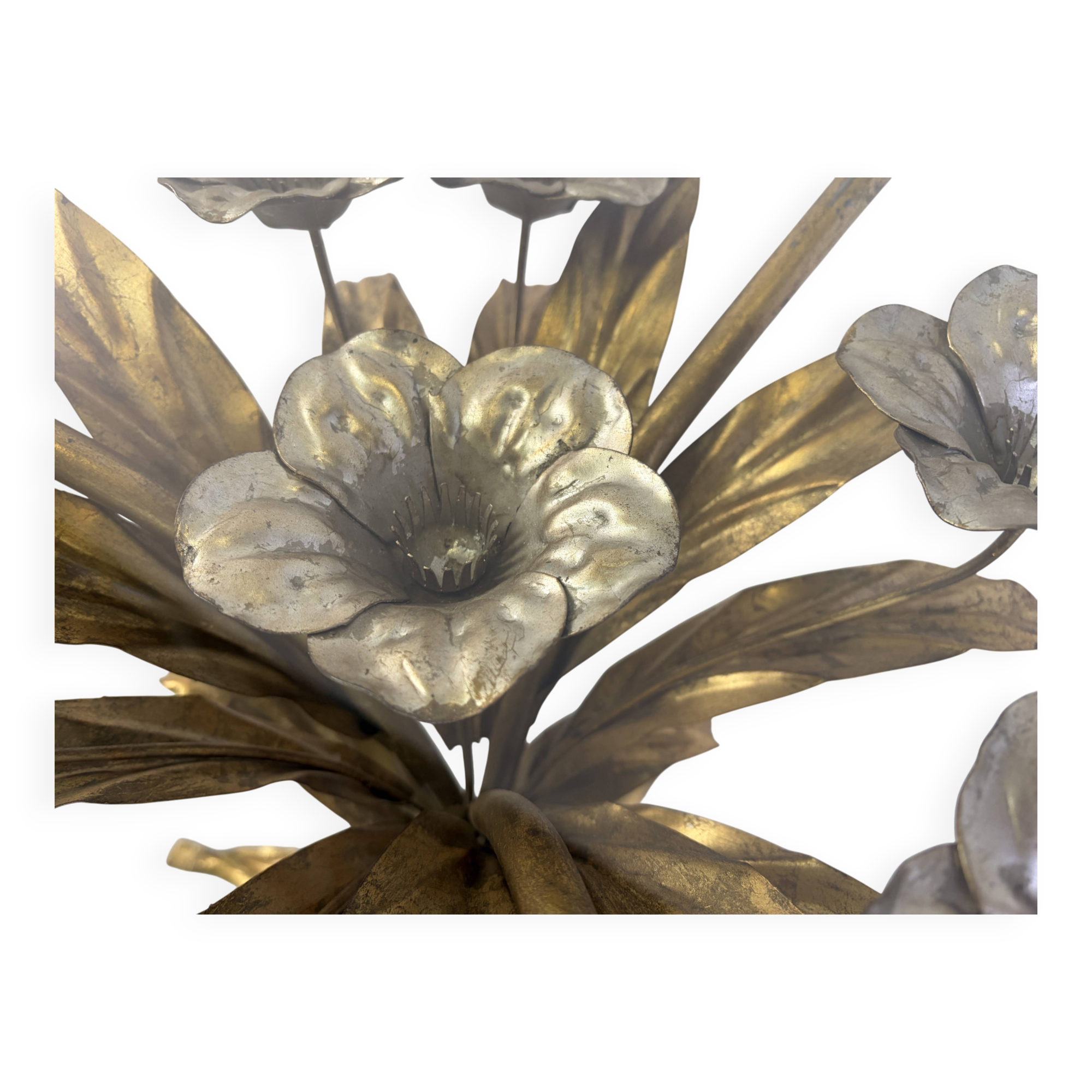 Charming metal flower coffee table or side table with a clear glass top. Made in Italy, attributed to Hans Kögl.