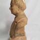 Bust of a notable in terracotta, 29 cm, signed Pasquet, 1870, on a base.