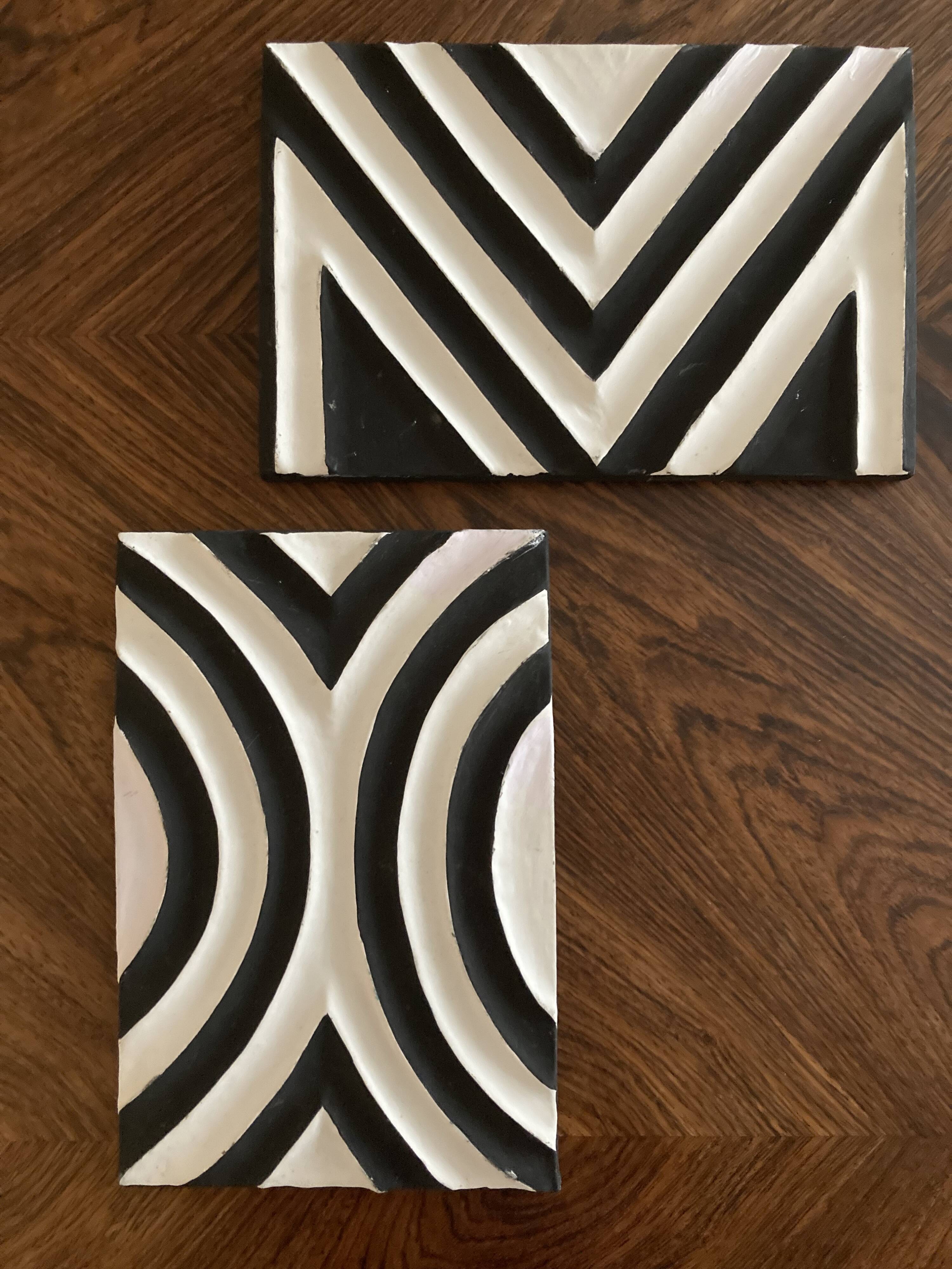 Two Imigongo paintings / panels traditional art from Rwanda