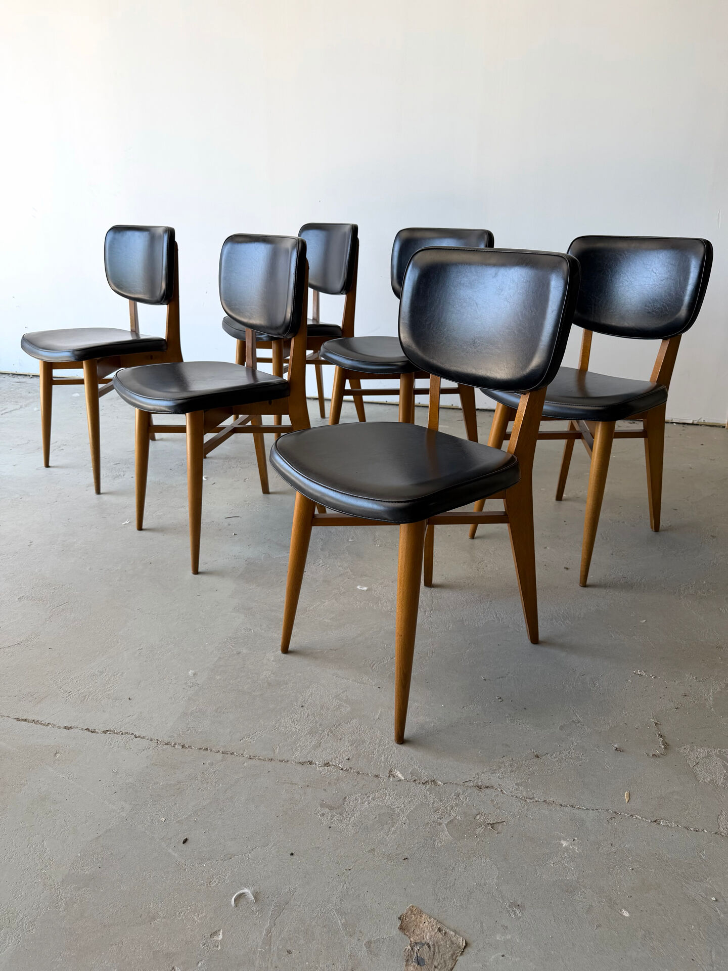 Set of 6 Scandinavian design chairs in solid beech and black Skai.