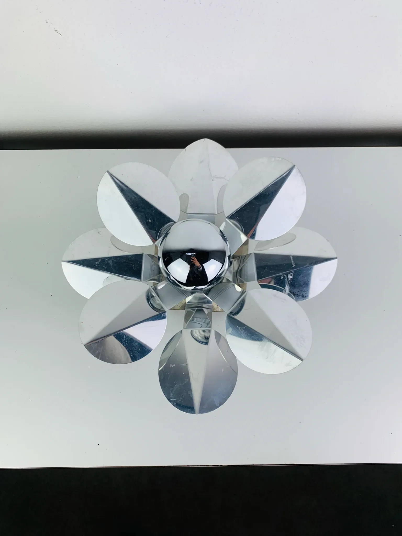 Space Age chrome flower wall light from the 1960s.