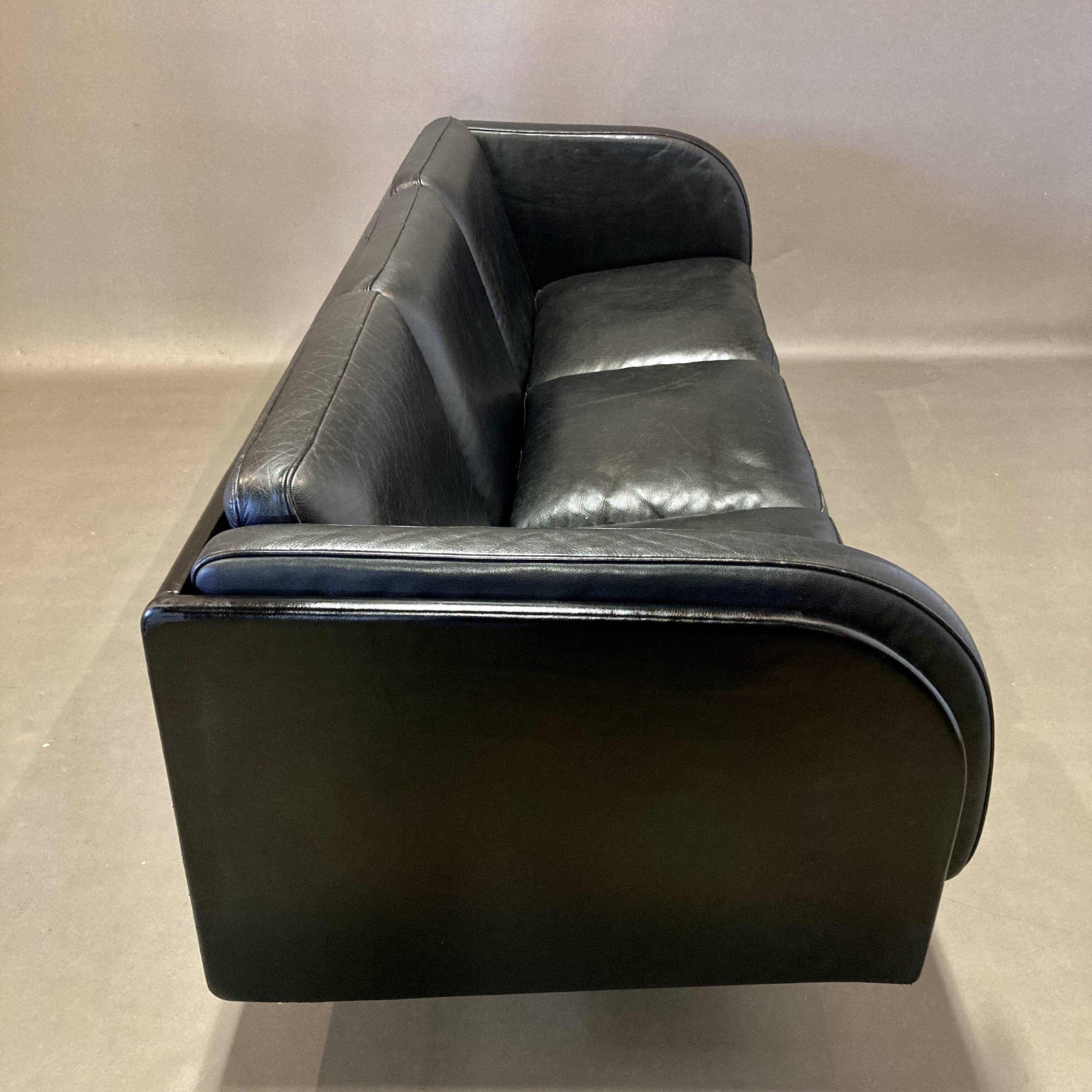 3-seater black leather sofa Scandinavian design 1960
