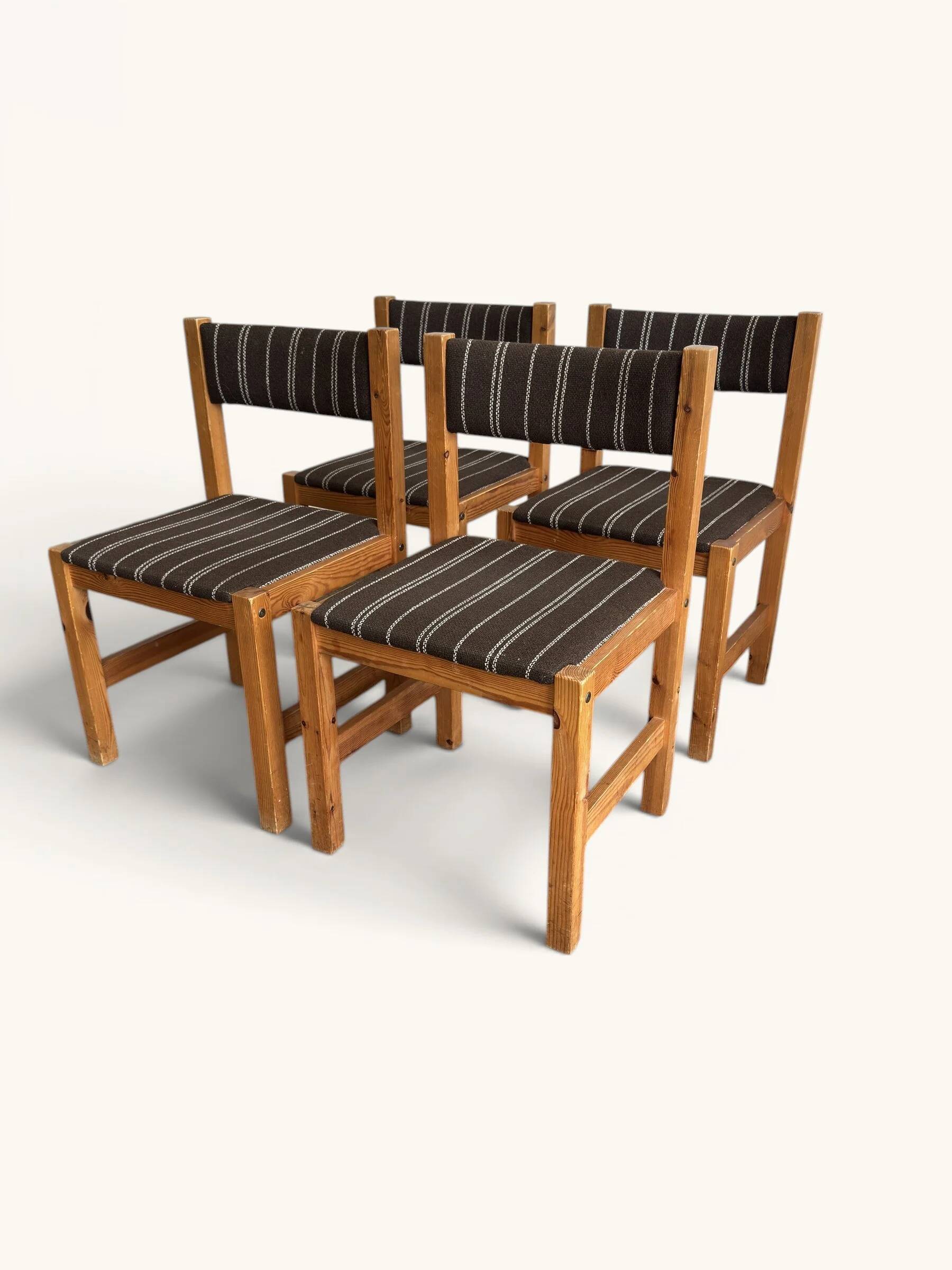 Set of 4 Danish dining chairs with brown striped upholstery.