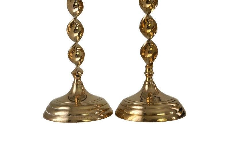Pair of mid-century twisted metal candle holders