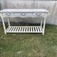 Console in painted wood, off-white patina, 3 drawers, lower shelf.