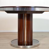 Round dining table with 1970s Italian design extension
