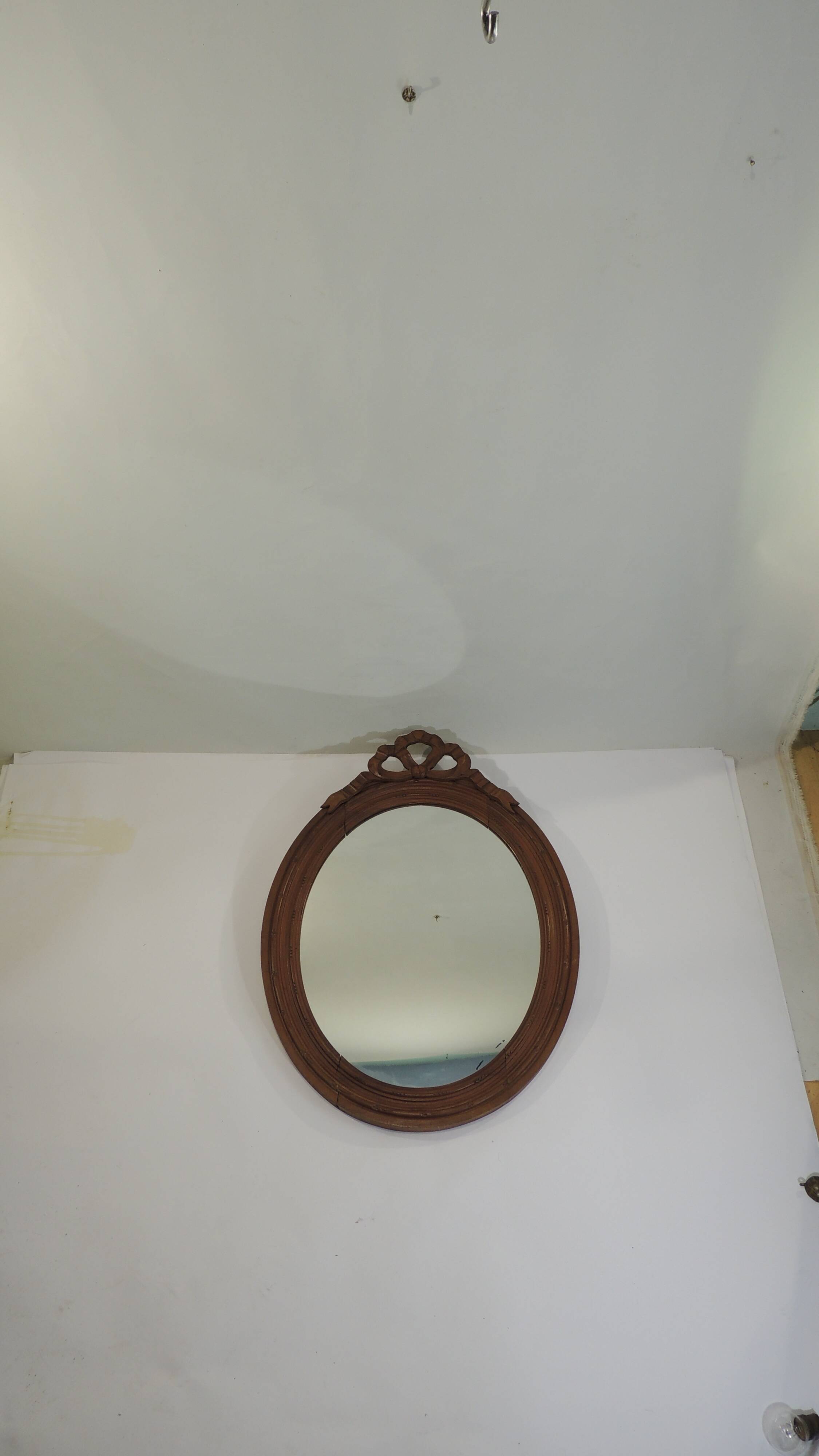 Antique oval mirror in carved wood – Louis XVI style, ribbon bow decoration, mid