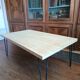 Coffee table in solid bamboo with steel legs.