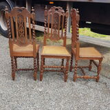 Carved antique chairs with rattan seat