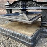 Old printing press in very old cast iron