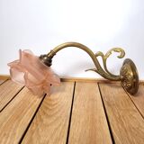 Old pink and golden brass wall lamp
